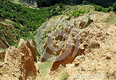 Stobskie piramidy or Stobâ€™s Pyramids unusual shaped red and yellow rock formation Stock Photo